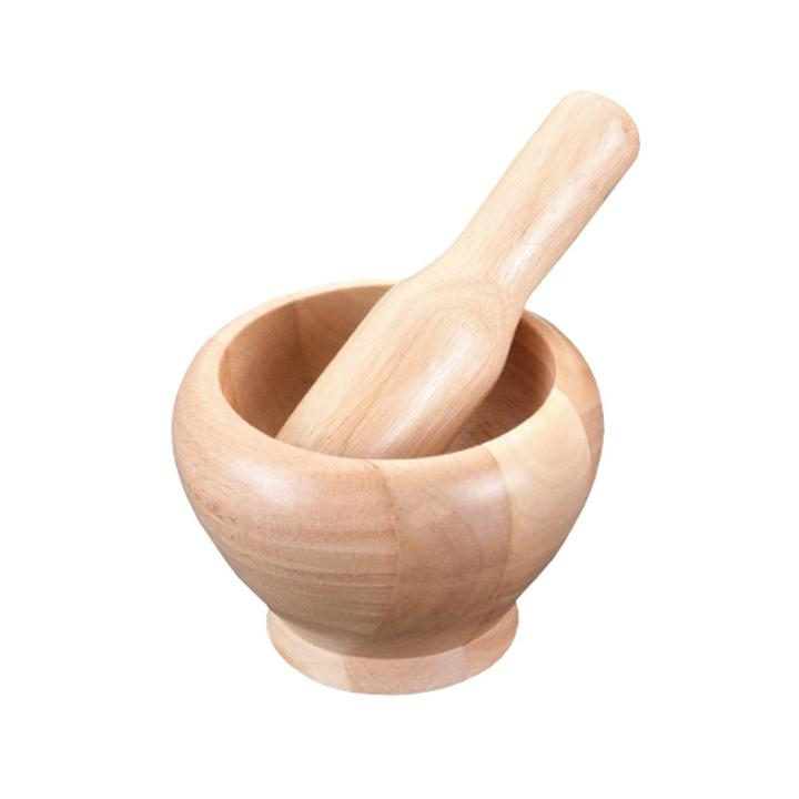 Mortero De Madera Con Mano